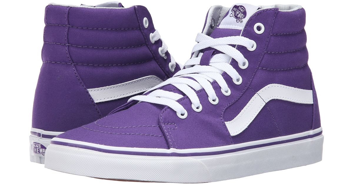 purple and turquoise vans